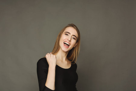 Collection of Joyful Expressions in a Collage Set With a Girl Celebrating a Moment of Happiness