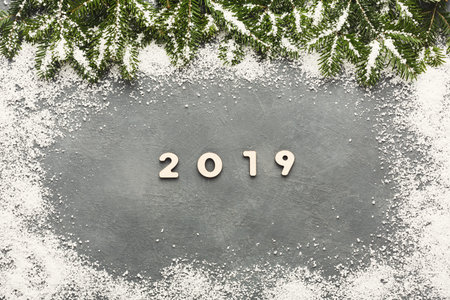 Collection of Winter Season Elements With 2019 Displayed on Gray Surface