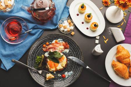 Collage of Food Items on a Table With Tea and Desserts During a Brunch Gatheringの写真素材