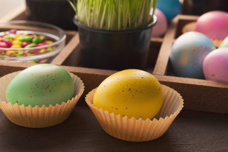 Colourful easter eggs in paper mold