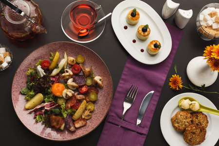 Collection of Colorful Food Dishes on a Table With a Drink and Dessert Offerings