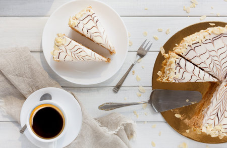 Enjoying Dessert and Coffee With Cake Slices on a Rustic Table Setting in Afternoon