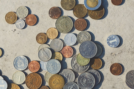 Coins Arranged in a Collage Showing Different Countries Over Time in a Collection