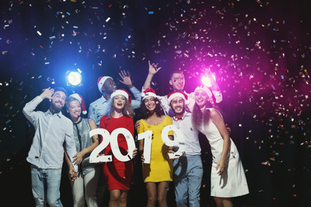 Friends Celebrate New Years Eve 2019 With Fun, Laughter, and Confetti at a Festive Party