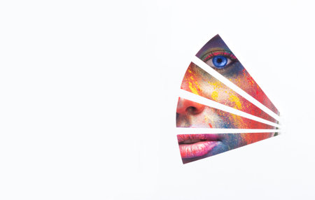 Fashion beauty girl behind paper geometry figureの写真素材