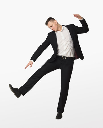 Portrait of young businessman playing marionette