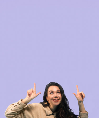 Woman Sitting on Bean Bag Chair Against Purple Background With Hands Raised