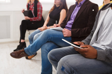 People Waiting in a Meeting Room for Their Turn During a Scheduled Event in the Afternoon