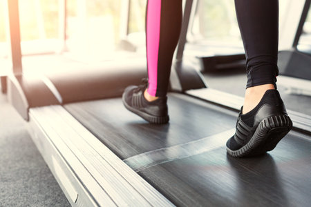 Collection of Images Showing a Person Exercising on a Treadmill in a Fitness Center Setting
