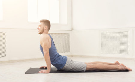 Fitness Routine for Strength and Flexibility in a Bright Indoor Space During Daytime