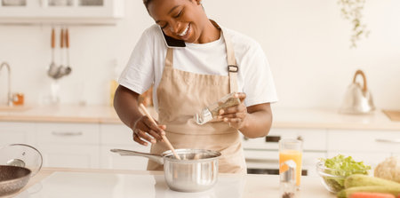 Cooking in the Kitchen While Talking on the Phone During the Afternoon