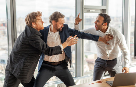 Three Businessmen Involved in Intense Argument in a Modern Office