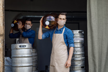 Male work in brewery during coronavirus quarantine