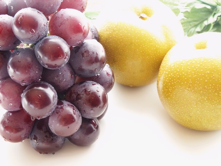 autumn fruit grapes and pearの写真素材