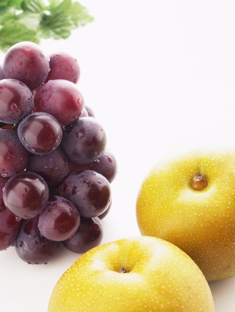 autumn fruit grapes and pearの写真素材