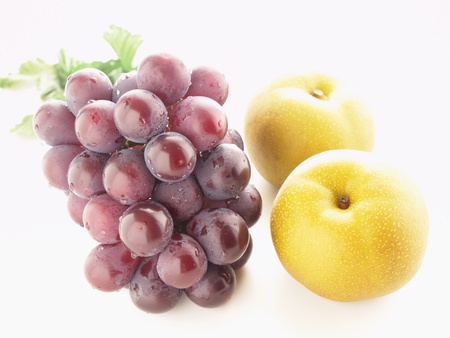 autumn fruit grapes and pearの写真素材