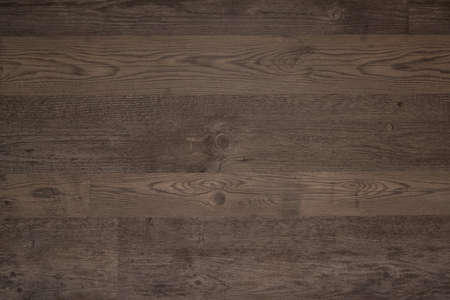 Brown wooden floor surface texture background backdrop wallpaper with copy space for text and design.の写真素材