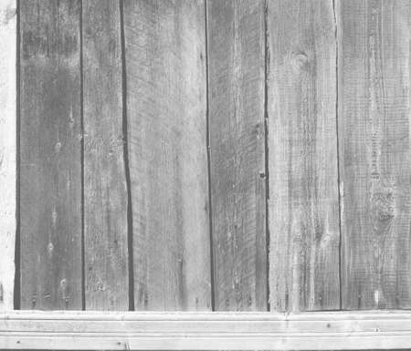 Wooden old boards texture with a white frame for the background with an empty space for text.の写真素材
