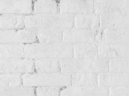 White old brick wall texture background design material.の写真素材