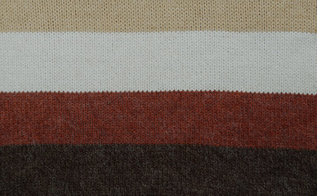 Knitted woolen striped colorful pattern fabric texture background,の写真素材
