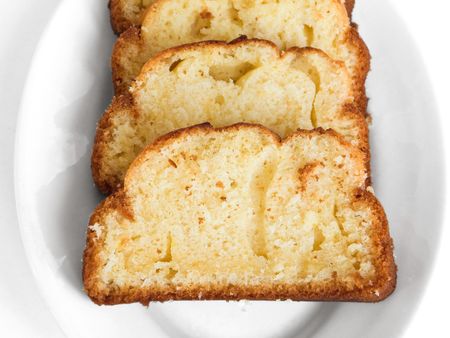 Food: This is a plumcake sliced on a white plate.の写真素材