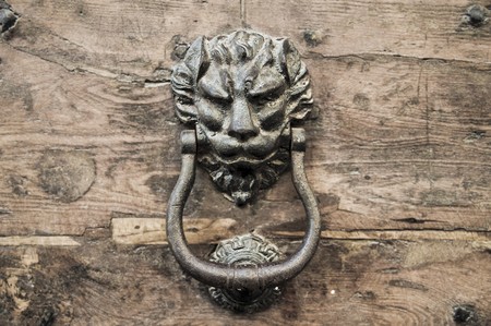 Doorknocker on allwood door.の写真素材