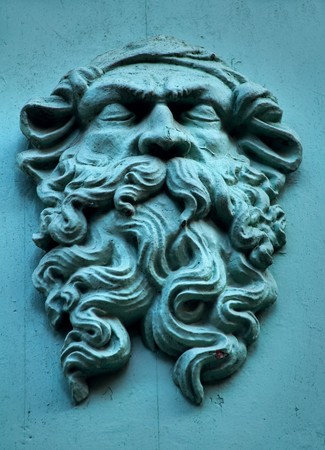 Carved face with close eyes.の写真素材