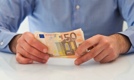 Man handling money.の写真素材