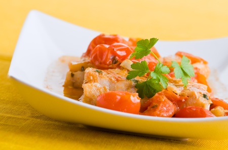Fish and cherry tomatoes.の写真素材