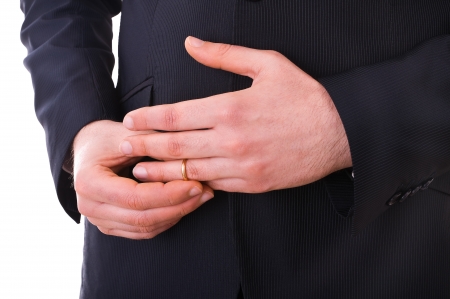 Business man taking off his wedding ring の写真素材