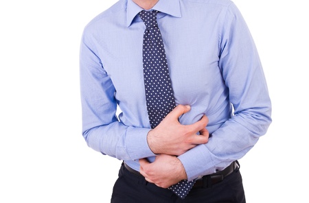 Businessman suffering from stomach pain の写真素材