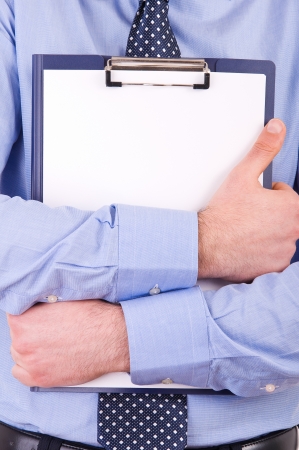 Businessman holding a clipboard.の写真素材