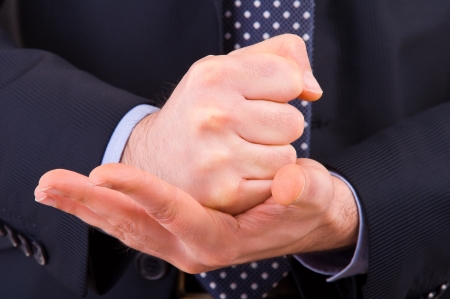 Businessman gesturing with both hands.の写真素材