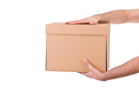 Delivery man with a boxの写真素材