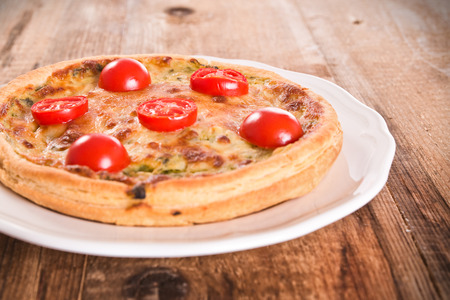 Leek and tomato quiche.の写真素材