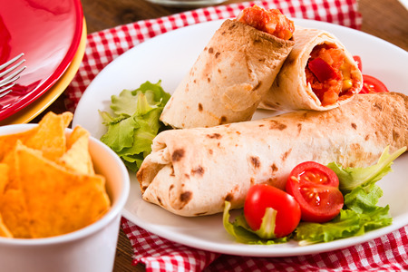 Tortilla wraps with chicken and vegetable. の写真素材