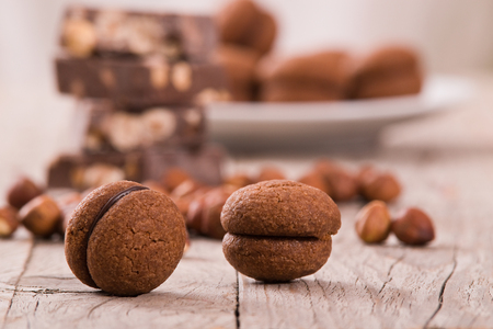 Hazelnut shortbread sandwiches filled with chocolate cream. の写真素材