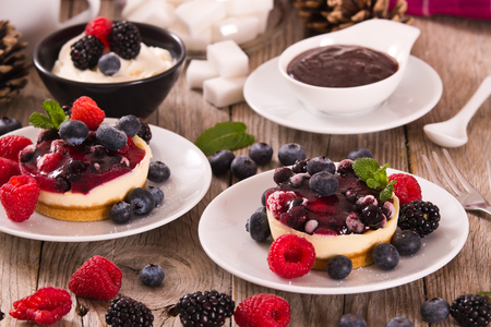 Cheesecakes with mixed berries.の写真素材