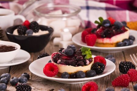 Cheesecakes with mixed berries.の写真素材