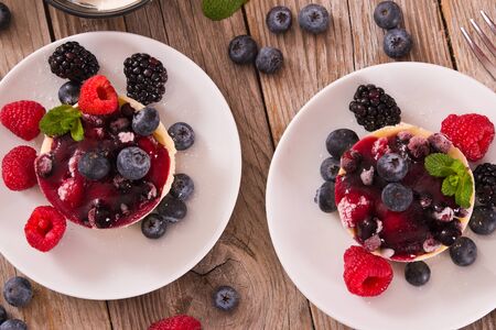 Cheesecakes with mixed berries.の写真素材