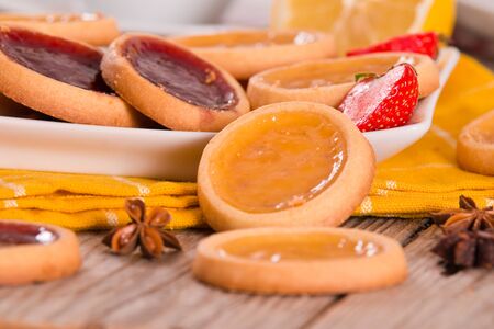 Lemon and straberry tartlets.の写真素材