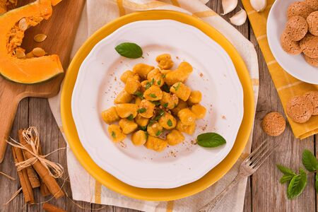 Pumpkin gnocchi with grated amaretti cookies.の写真素材