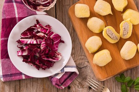 Potato gnocchi stuffed with radicchio and ricotta.の写真素材