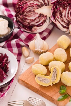 Potato gnocchi stuffed with radicchio and ricotta.の写真素材