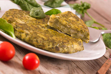 Spanish omelette with spinach.