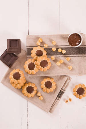 Flower shaped chocolate biscuits.の写真素材