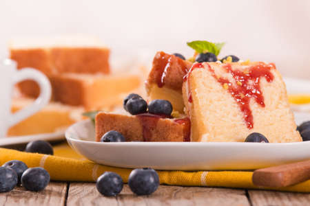 Lemon cake with blueberries and mint.