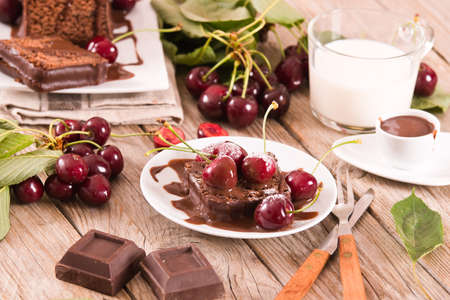 Chocolate pound cake with cherries.の写真素材