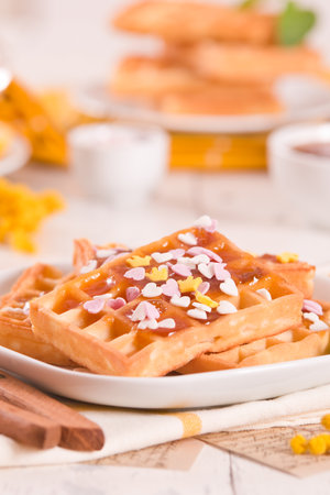 Waffles with jam and confetti.の写真素材