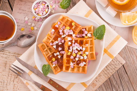 Waffles with jam and confetti.の写真素材